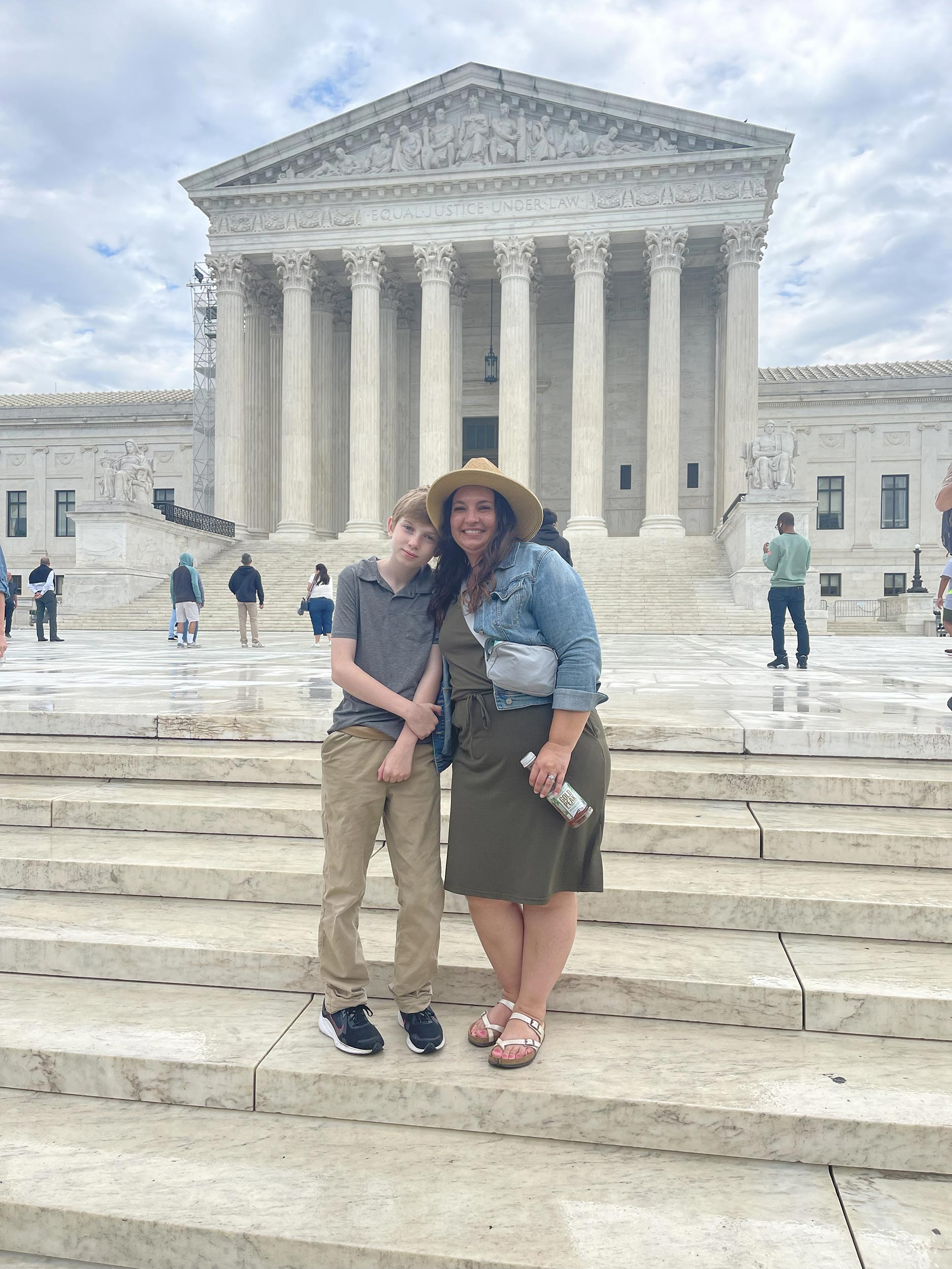 Christine and her son, Nolan, at the United States Supreme Court Building